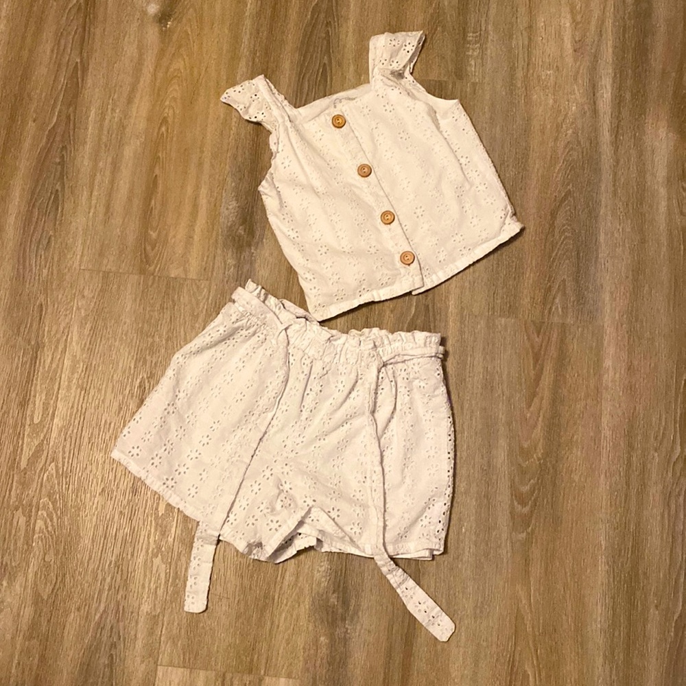 white button up top with draw string shorts